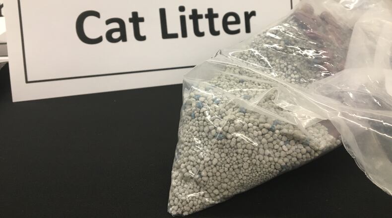 Cat litter can be used to dispose of unwanted or unused prescription pills safely, according to the Ohio Pharmacists Association. Pour water into a plastic, sealable bag with the litter and the pills, mix them up and then dispose in the trash. KATIE WEDELL/STAFF