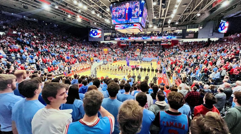 Dayton fans stand for the national anthem before a game against St. Bonaventure on Friday, Feb. 2, 2024, at UD Arena. David Jablonski/Staff
