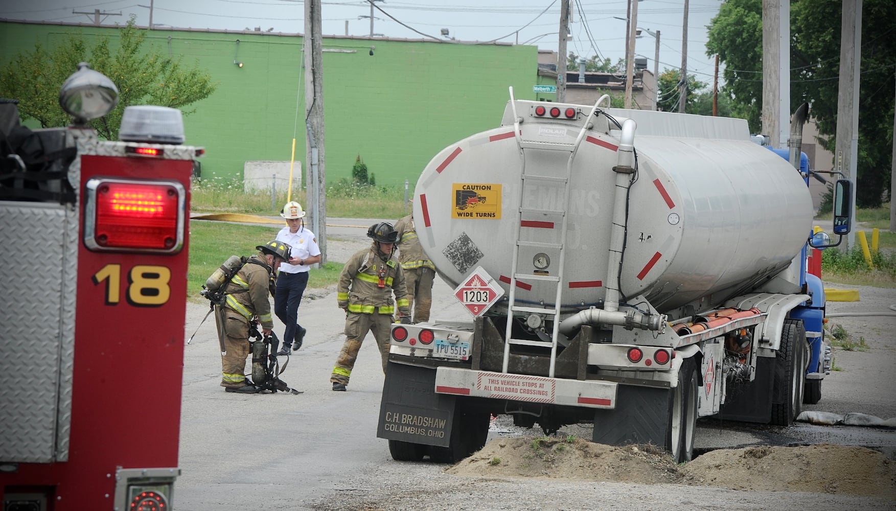 Gasoline tanker truck leaking gas