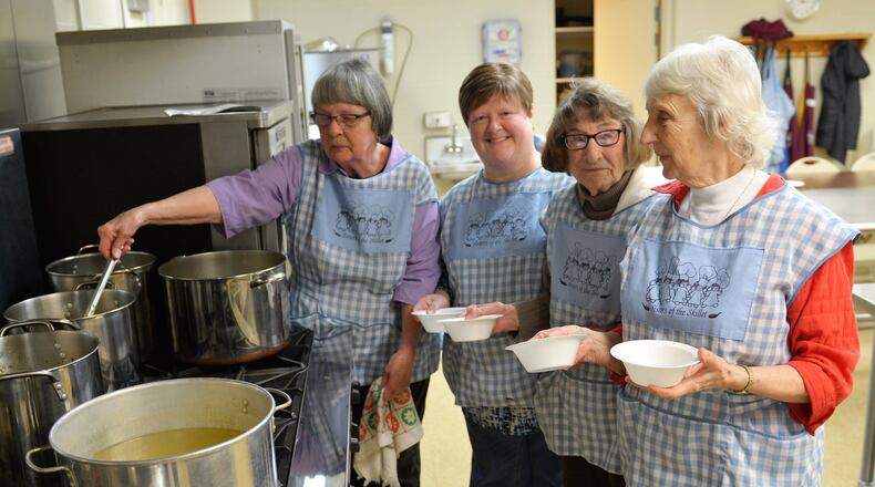 Some members of the Sisters of the Skillet work with the turkey noodle soup during the annual Art for Heart event at Zion Lutheran Church, Tipp City, in February. Pictured (from left): Ruth White, Jill Greer, Peggy McCoy and Miriam Comer. CONTRIBUTED