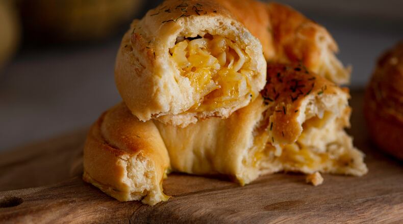 Piroshky Piroshky, a Seattle-based Eastern European-inspired bakery, is making a stop in Dayton to deliver its famous handheld pies to area residents. Pictured is a Potato & Cheese Piroshky. CONTRIBUTED PHOTO