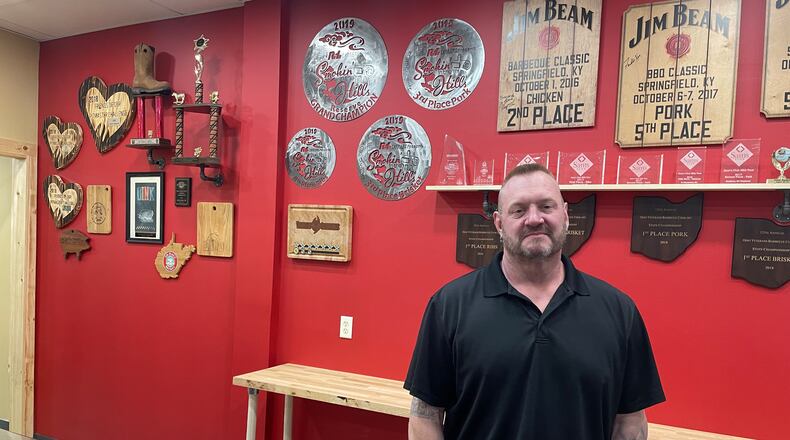 Ray’s BBQ has officially opened its doors at 3311 Seajay Drive in the Beaver Valley Shopping Center in Beavercreek. Pictured is owner Ray McIntire. NATALIE JONES/STAFF
