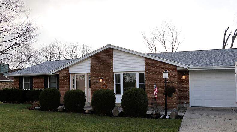 The 3-bedroom, brick ranch with about 1,740 sq. ft. of living space has had recent updates during the past year, including dimensional roof shingles, vinyl tilt-in windows and garage door. CONTRIBUTED PHOTO BY KATHY TYLER