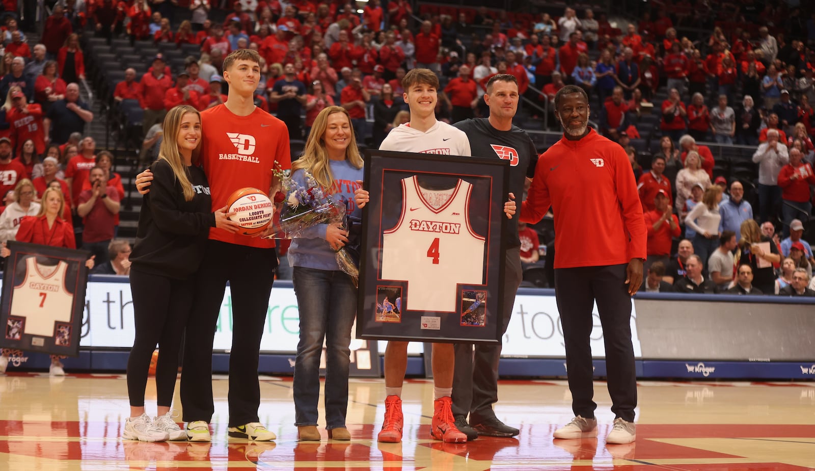 Dayton's Jordan Derkack is honored with his family on Senior Night before a game against Virginia Commonwealth on Friday, March 6, 2026, at UD Arena. Aiden Derkack, Jordan's brother, is second from left. David Jablonski/Staffnski/Staff