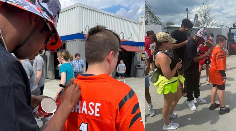 A person who looked like Cincinnati Bengals football player Ja'Marr Chase signs an autograph at Kings Island. CONTRIBUTED/WCPO VIA MEGAN DASHLEY ON FACEBOOK