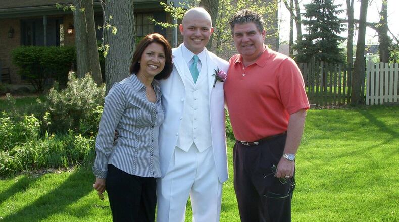 Blake LaForce, a handsome vision in white, with his parents Linda and Mark before the Vandalia Butler prom in April of 2008. A few days later he got a bone marrow transplant at Cincinnati Children's Hospital in hopes of combating his Acute Lymphoblastic Leukemia. CONTRIBUTED