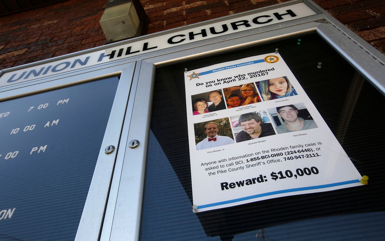 Reward poster for information about the Rhoden family murders.  Eight members of the Rhoden family were killed in rural Pike County in the early morning hours of April 22, 2016.  One year later, the murder case remains unsolved.  TY GREENLEES / STAFF