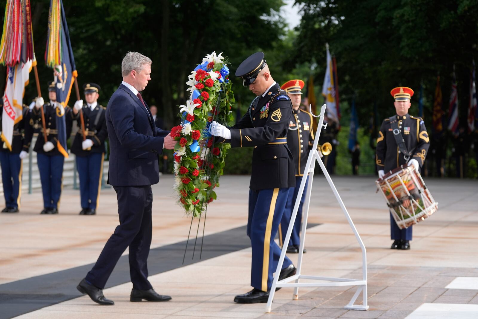 Secretary of the Army Daniel Driscoll lays a wreath at the Tomb of the Unknown Soldier at Arlington National Cemetery, honoring the Army's 250th anniversary and coinciding with President Donald Trump's 79th birthday, Saturday, June 14, 2025, in Arlington, Va. (AP Photo/Manuel Balce Ceneta)