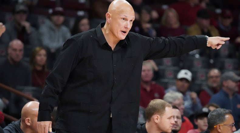 South Carolina head coach Frank Martin communicates with players during the first half of an NCAA college basketball game against Auburn Tuesday, Jan. 4, 2022, in Columbia, S.C. (AP Photo/Sean Rayford)