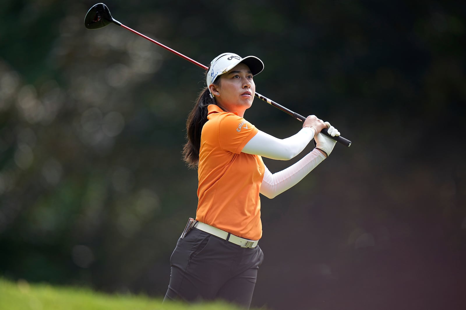 Jeeno Thitikul, of Thailand, plays on the 4th hole during the last round of the Evian Championship women's golf tournament, in Evian, eastern France, Sunday, July 13, 2025. (AP Photo/Laurent Cipriani)