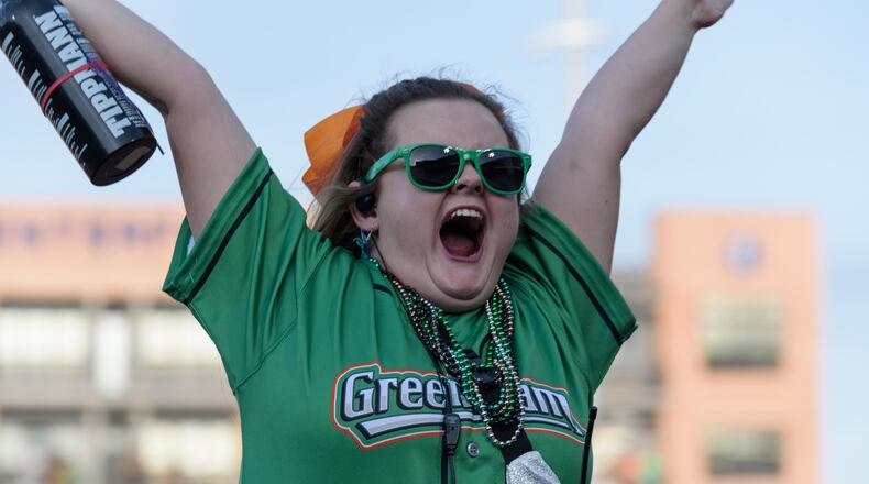 The Dayton Dragons played their home opener on Tuesday, Apr. 11, 2023 at Day Air Ballpark in downtown Dayton to a sellout crowd of 8,135, extending the team’s streak to 1,442 games, an all-time record for professional sports franchises. The Dragons lost to the Great Lakes Loons 9-7. Did we spot you there? TOM GILLIAM/CONTRIBUTING PHOTOGRAPHER