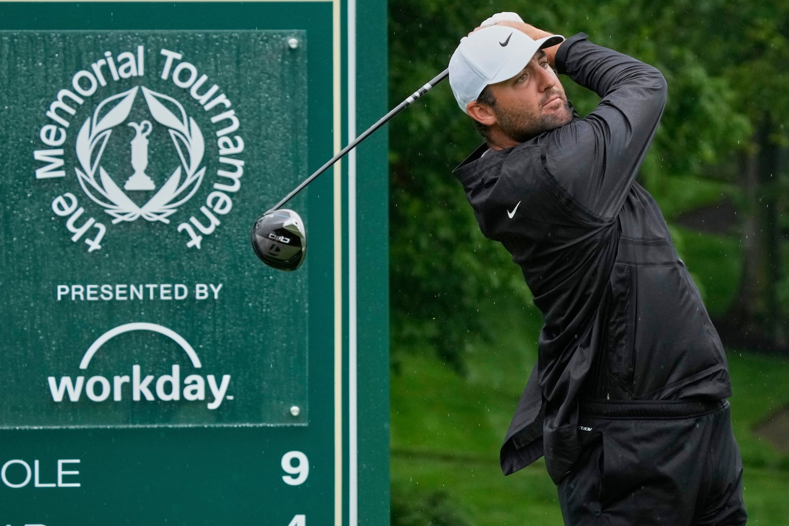 Scottie Scheffler hits from the ninth tee during the second round of the Memorial golf tournament, Friday, May 30, 2025, in Dublin, Ohio. (AP Photo/Sue Ogrocki)