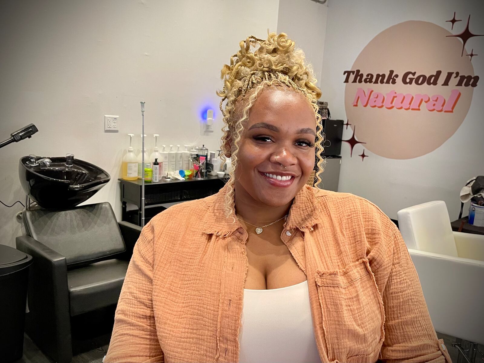 Chairapy, a textured hair salon, is located at 605 E. Fifth St. in Dayton's Oregon District. Pictured is Owner Asha Parson. NATALIE JONES/STAFF