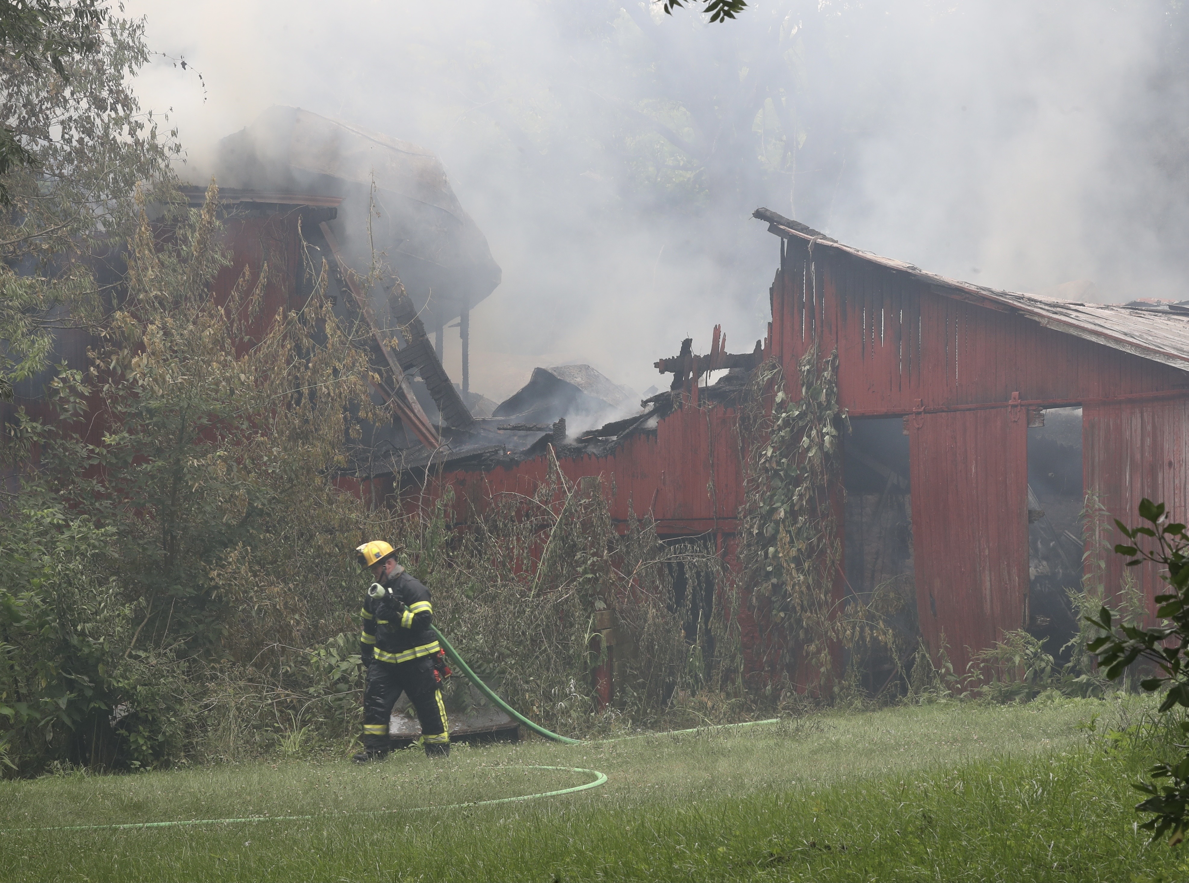 Multiple fire departments responded to a barn fire on North Hampton Road in Bethel Twp. on Friday, June 25, 2021. BILL LACKEY / STAFF