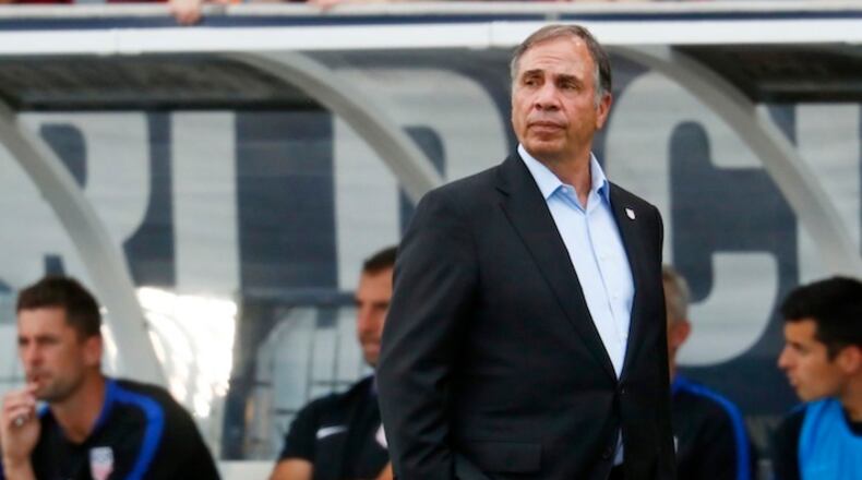 U.S. coach Bruce Arena watches during the first half of the team's World Cup soccer qualifying match against Trinidad & Tobago on Thursday, June 8, 2017, in Commerce City, Colo. (AP Photo/David Zalubowski)