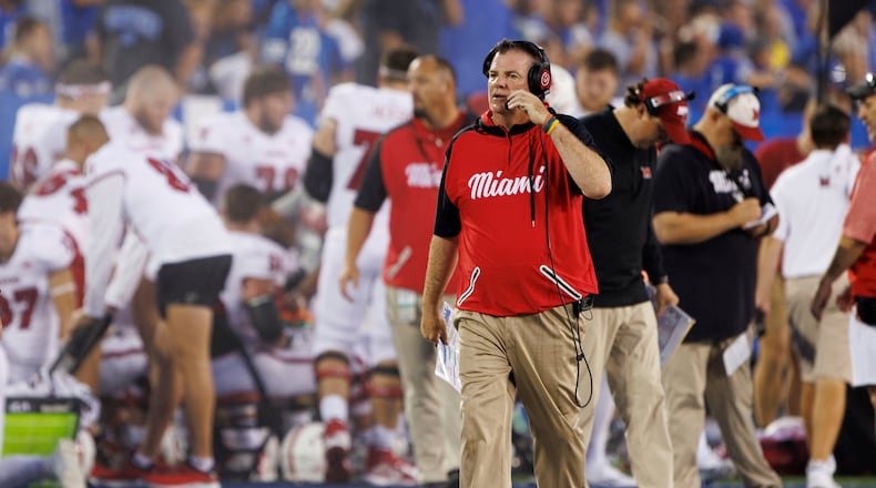 Miami (Ohio) head coach Chuck Martin walks down the sideline during the first half of an NCAA college football game against Kentucky in Lexington, Ky., Saturday, Sept. 3, 2022. (AP Photo/Michael Clubb)