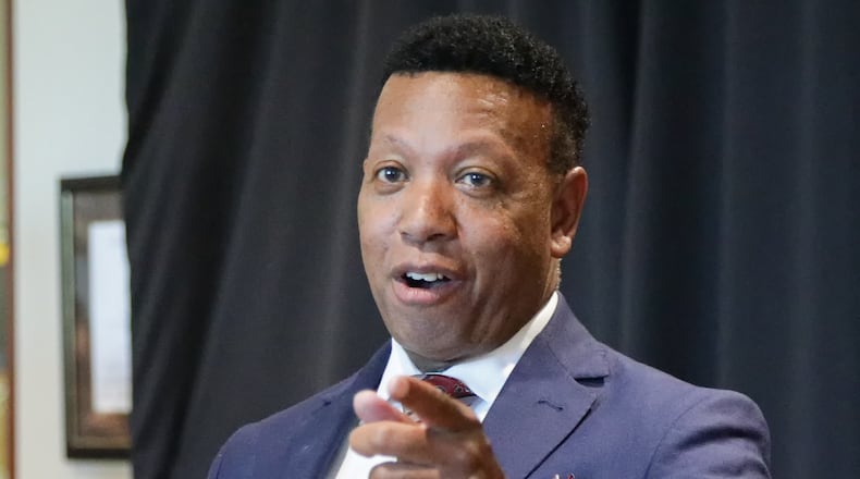 Kindred Hospital Dayton CEO Reginald Lee speaks during a celebration of the hospital's reopening of its behavioral health unit on Wednesday, Aug. 27. Lee said there was too much emphasis on telemedicine for psychiatric consultations before Kindred brought management of its inpatient behavioral health unit in-house earlier this month. BRYANT BILLING / STAFF