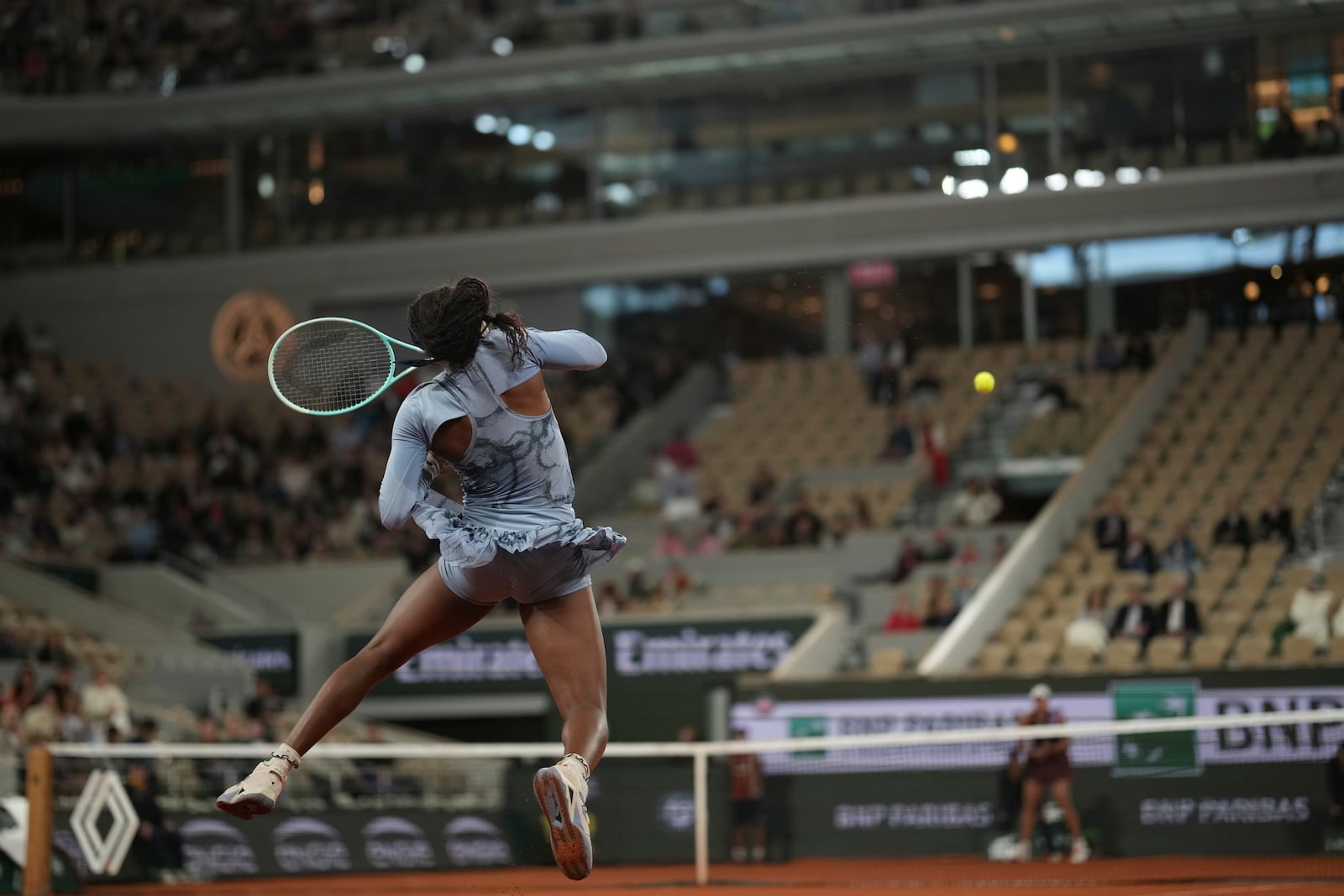 Coco Gauff of the U.S. plays a shot against Madison Keys of the U.S. during their quarterfinal match of the French Tennis Open at the Roland-Garros stadium in Paris, Wednesday, June 4, 2025. (AP Photo/Christophe Ena)