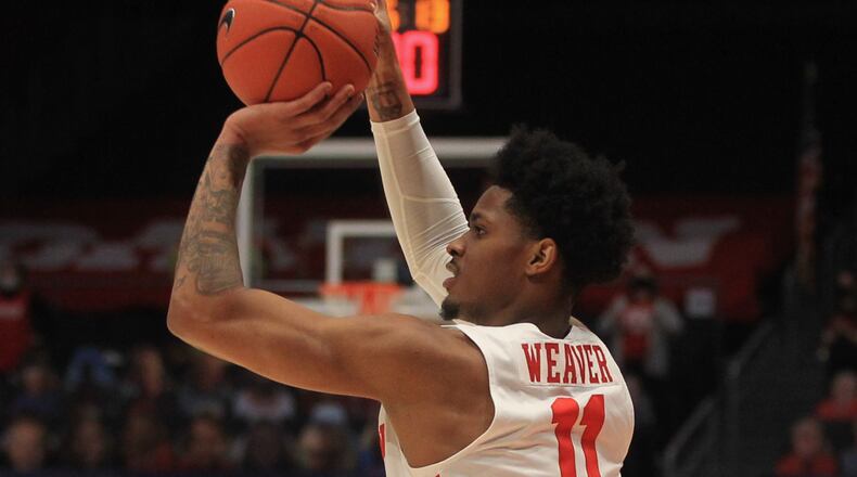 Dayton's Elijah Weaver shoots against Duquesne on Wednesday, Jan. 13, 2021, at UD Arena. David Jablonski/Staff