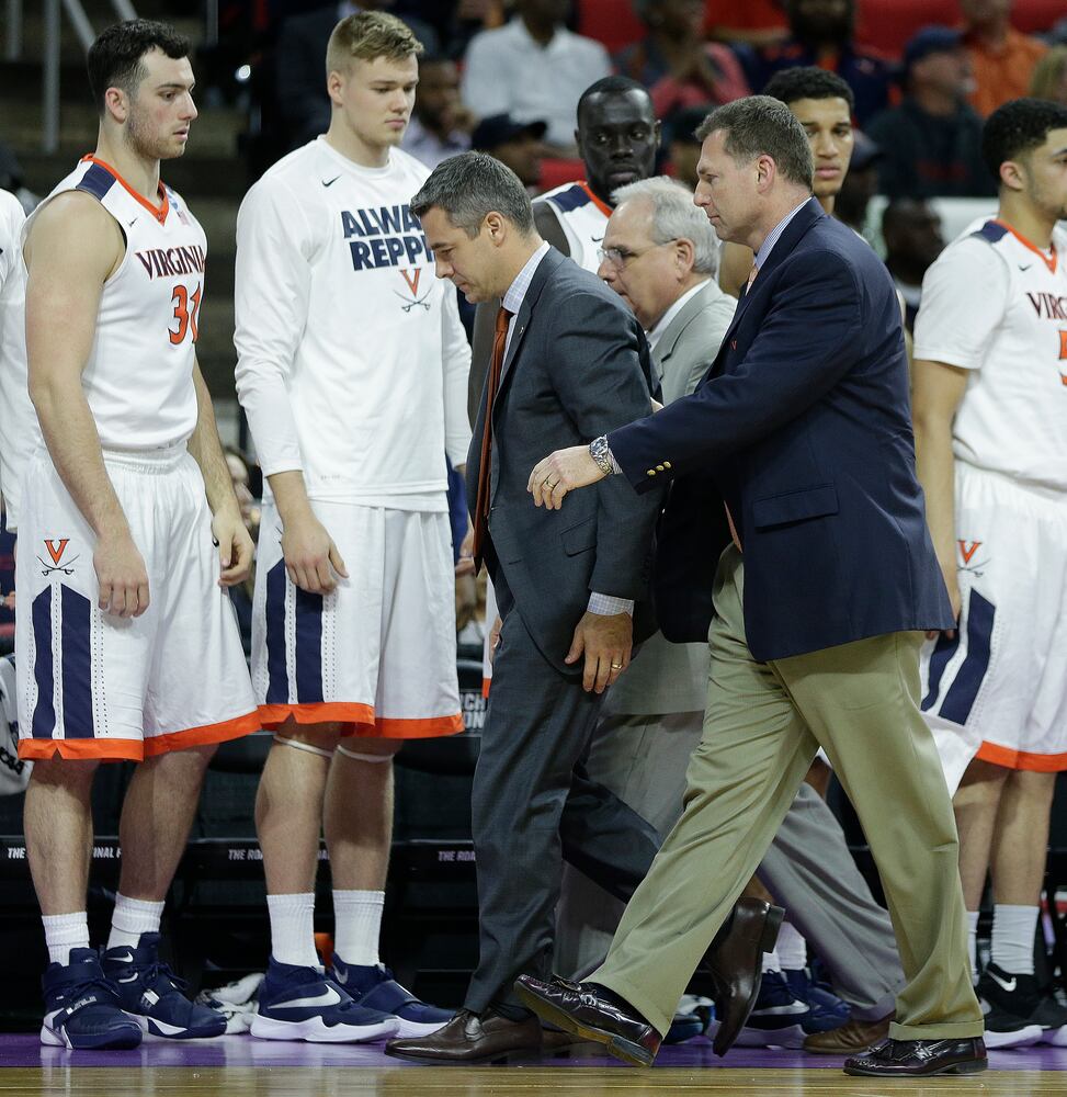Virginia coach collapses at NCAA tourney