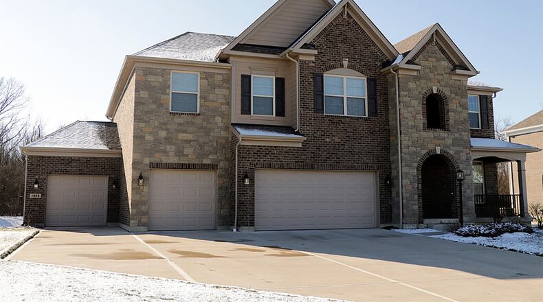 The 2-story home with about 4,880 sq. ft. of living space has a 4-car garage, loft family room, finished basement with recreation room, study and half bath. CONTRIBUTED PHOTO BY KATHY TYLER