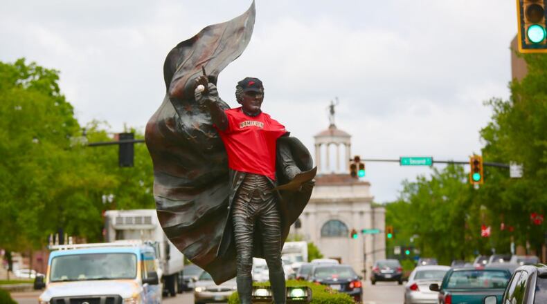 The iconic Alexander Hamilton statue in downtown Hamilton is sporting a Hamilton Joes jersey in honor of the team’s opening night, June 15. GREG LYNCH/STAFF