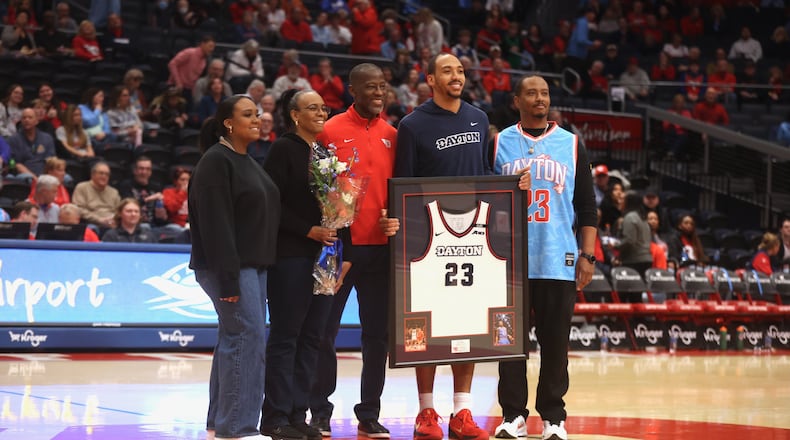 Dayton's Zed Key is honored on Senior Day before a game against Richmond on Saturday, March 1 2025, at UD Arena. David Jablonski/Staff