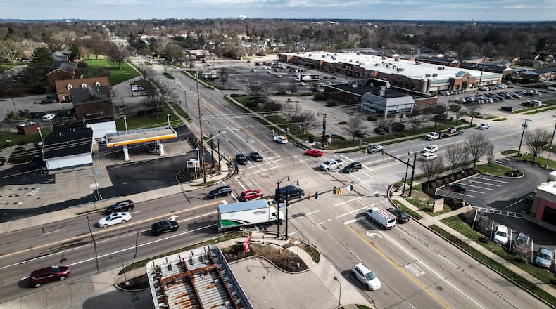 Traffic signal reconstruction at the intersection of Spring Valley Pike and South Main Street near downtown Centerville started last April and was scheduled to wrap up by Oct. 31, but supply chain issues have caused delays. The project is now set to be completed by mid-April. JIM NOELKER/STAFF