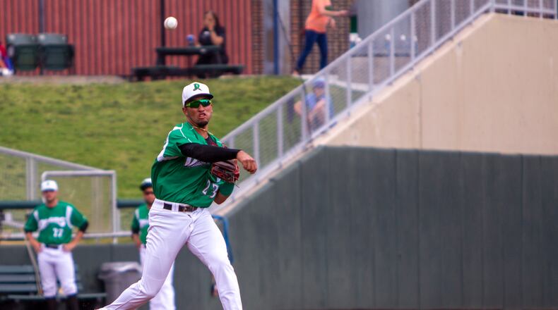 Dragons shortstop Miguel Hernandez throws out a West Michigan batter during Sunday's game at Day Air Ballpark. Jeff Gilbert/CONTRIBUTED