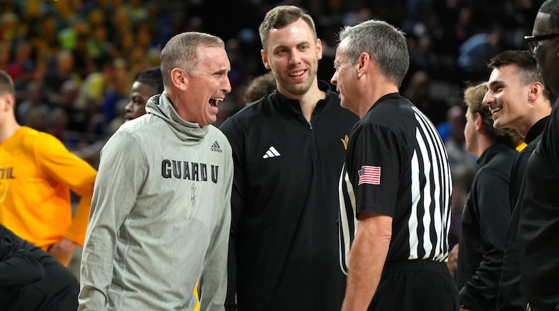 Arizona State head coach Bobby Hurley talks with a referee during the first half of an NCAA college basketball game against Kansas, Tuesday, March 3, 2026, in Tempe, Ariz. (AP Photo/Rick Scuteri)