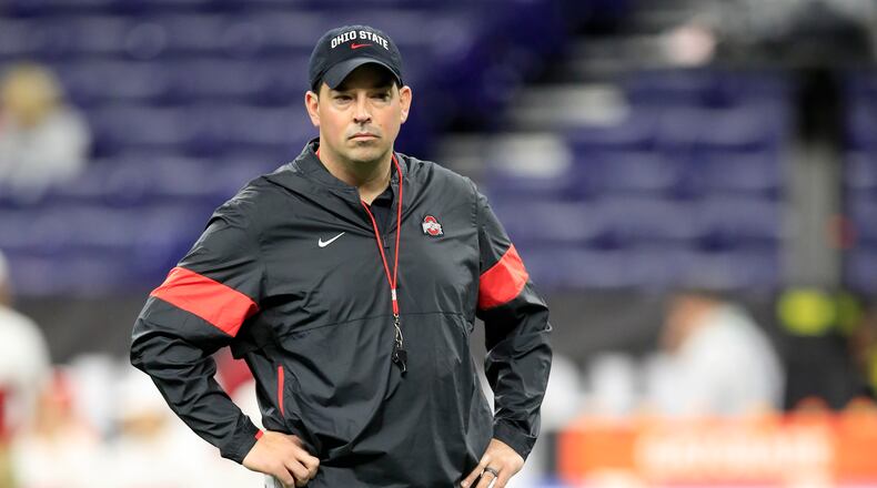 INDIANAPOLIS, INDIANA - DECEMBER 07: Ryan Day the head coach of the Ohio State Buckeyes watches his team practice before the start of the BIG Ten Football Championship game against the Wisconsin Badgers at Lucas Oil Stadium on December 07, 2019 in Indianapolis, Indiana. (Photo by Andy Lyons/Getty Images)