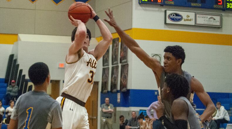 Alter’s Brady Uhl shoots in the lane during the first half of Tuesday night’s Division II tournament game against Ponitz at Springfield High School. Jeff Gilbert/CONTRIBUTED