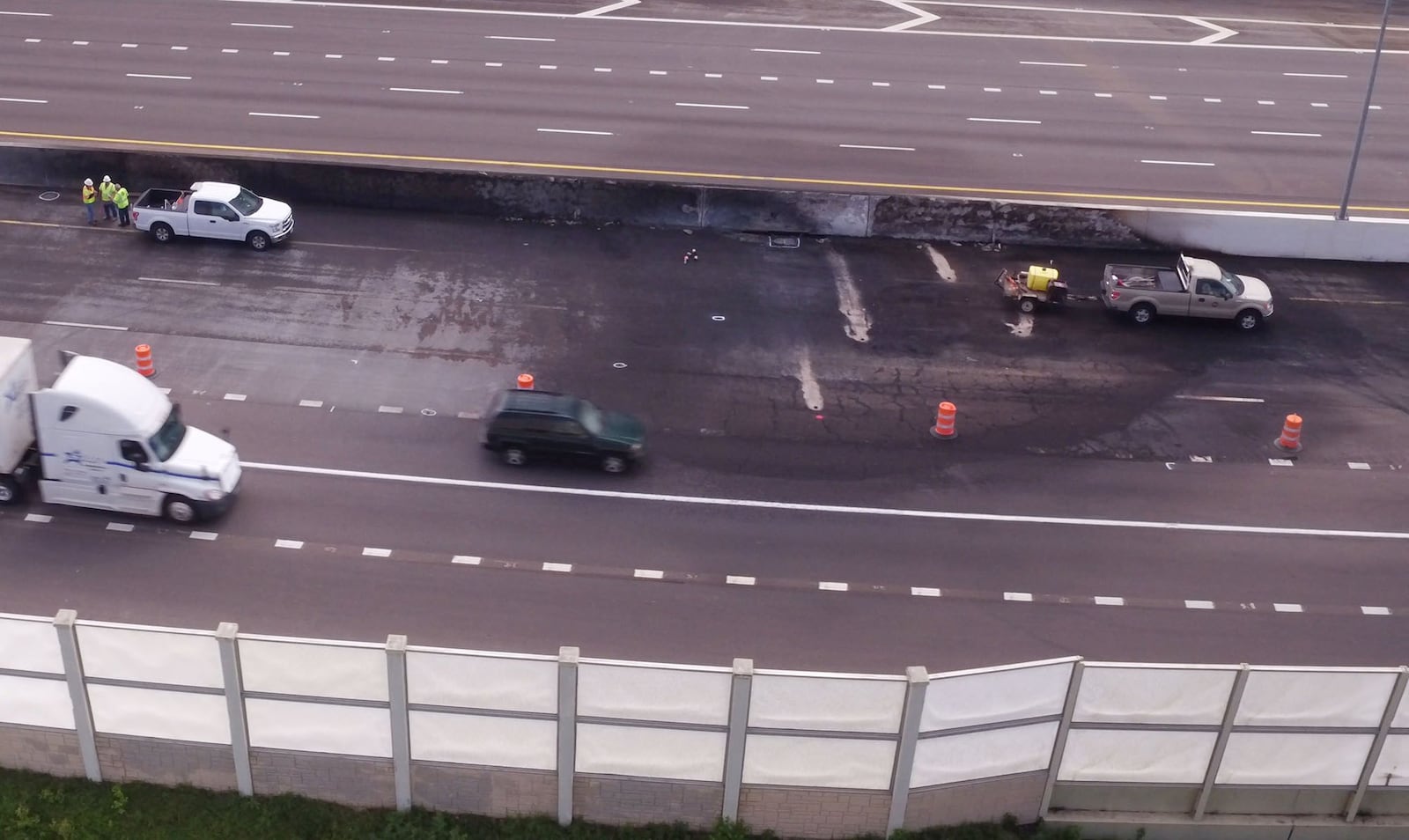 Emergency repair work continued I-75 in Dayton on Monday after a fiery fatal crash closed the highway on Sunday, April 30. A wrong-way driver crashed, head-on, with a gasoline tanker that caught fire. TY GREENLEES / STAFF