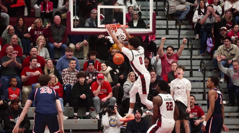 Derek Simpson, of Saint Joseph’s, dunks in the sec ond half against Dayton on Saturday, Jan. 24, 2026, at Hagan Arena in Philadelphia. David Jablonski/Staff