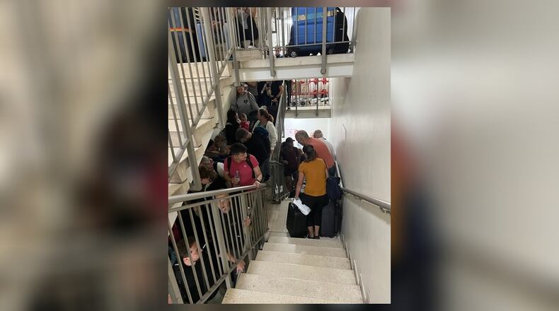 People trying to leave Israel are shown at the Ben Gurion Airport going down the stairwell to find shelter. Springfielders Larry and Kim Fish, who were in Israel when Hamas attacked, were forced to seek shelter from incoming missiles as they worked to leave the country Saturday. Contributed/Kim Fish