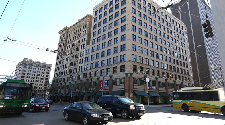The Reibold Building stands at the southwest corner of Fourth and Main Streets in downtown Dayton. The building was constructed in three phases; the center section in 1896, the south annex in 1904 and the north annex in 1914. LISA POWELL / STAFF