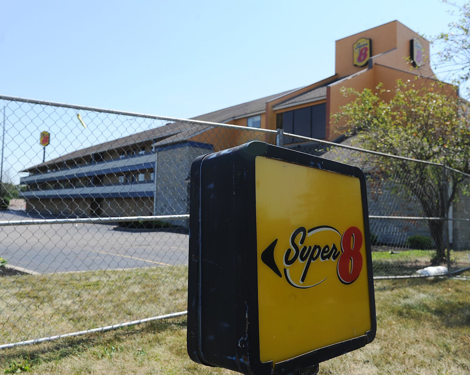 The Super 8 motel in Vandalia is boarded up and fenced off from the public. MARSHALL GORBY\STAFF