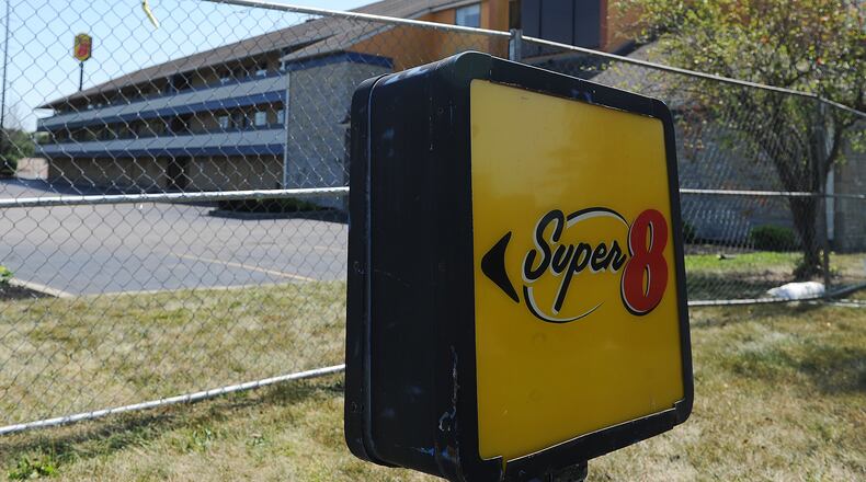 The Super 8 motel in Vandalia is boarded up and fenced off from the public. MARSHALL GORBY\STAFF