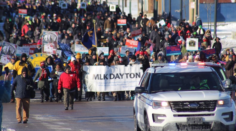 Hundreds of people gathered in Dayton on Monday morning to march in celebration of Martin Luther King Jr. Marchers started near The Charles Drew Health Center on West Third Street and ended at the Dayton Convention Center.
