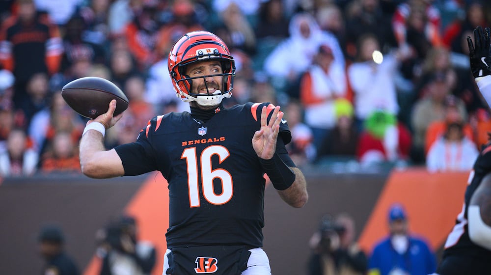 Cincinnati Bengals quarterback Joe Flacco steps back to pass in the second quarter of their game against the New England Patriots on Saturday, Nov. 23, 2025 at Paycor Stadium. JEREMY MILLER / CONTRIBUTED PHOTO