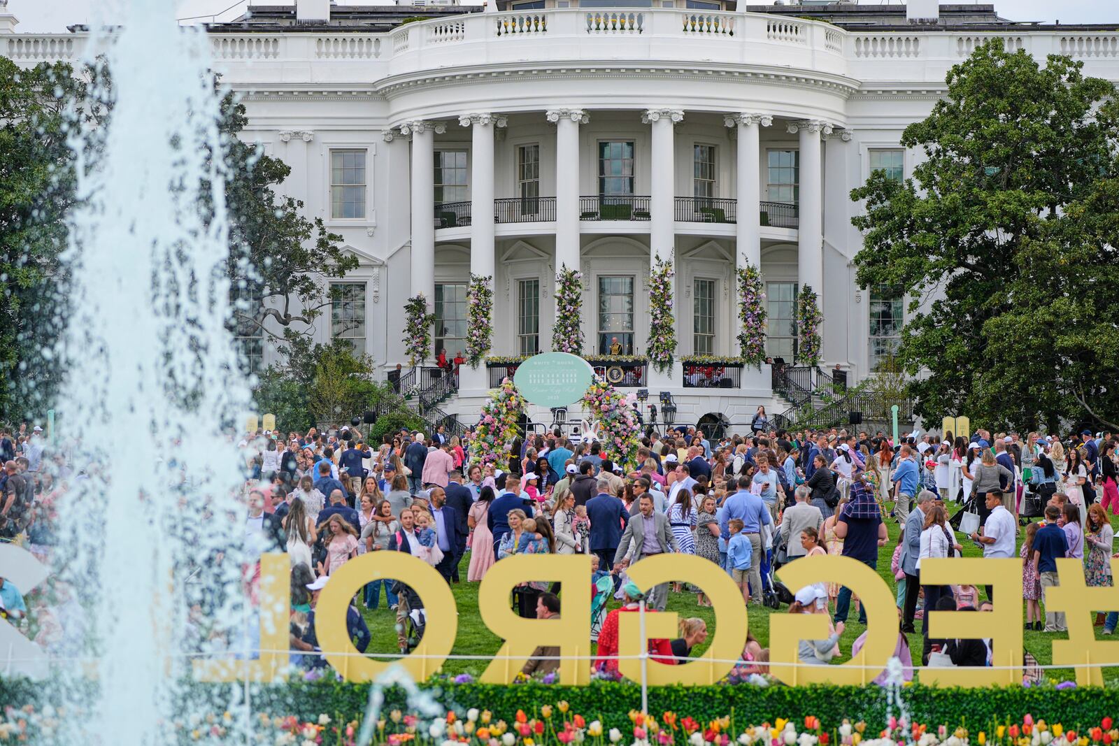 Guests arrive on the South Lawn of the White House before President Donald Trump and first lady Melania Trump participate in the White House Easter Egg Roll Monday, April 21, 2025, in Washington. (AP Photo/Alex Brandon)