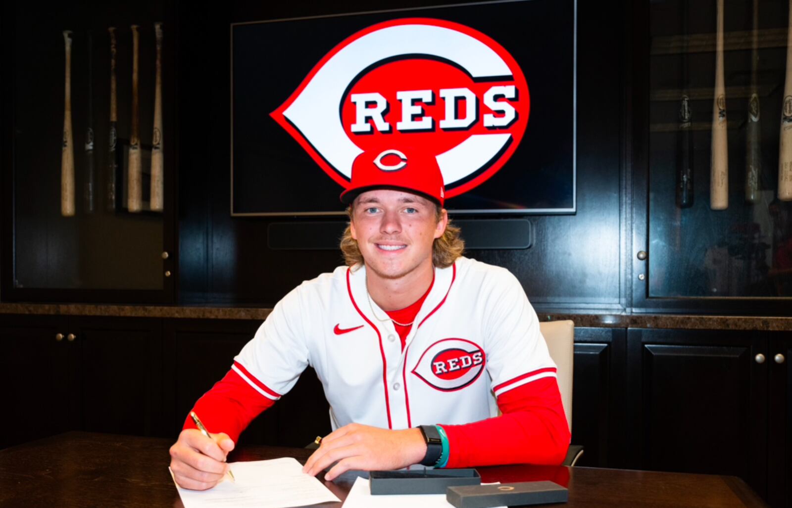 Luke Hayden signing with the Reds last year as an eighth round pick. CONTRIBUTED PHOTO