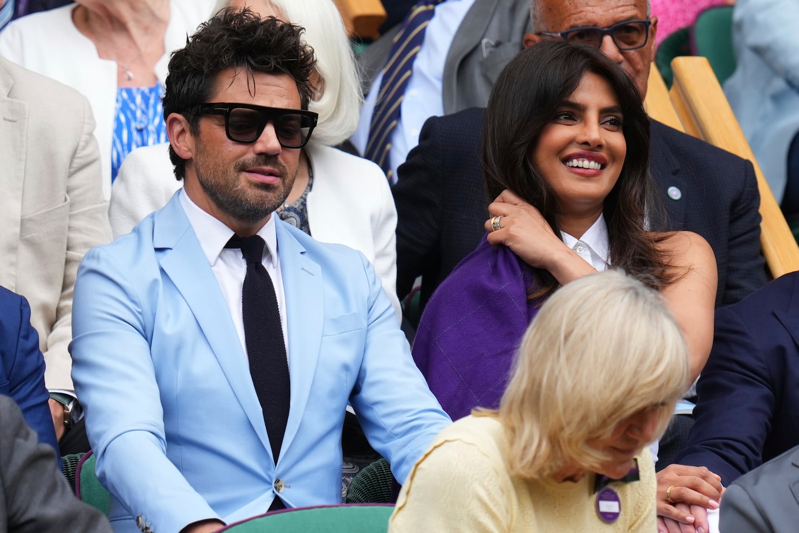 Indian actress Priyanka Chopra, right, and English actor Dominic Cooper sit in the Royal Box at Centre Court during the Wimbledon Tennis Championships in London, Wednesday, July 2, 2025.(AP Photo/Kirsty Wigglesworth)