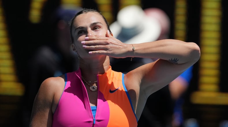 Aryna Sabalenka of Belarus celebrates after defeating Victoria Mboko of Canada in their fourth round match at the Australian Open tennis championship in Melbourne, Australia, Sunday, Jan. 25, 2026. (AP Photo/Dita Alangkara)