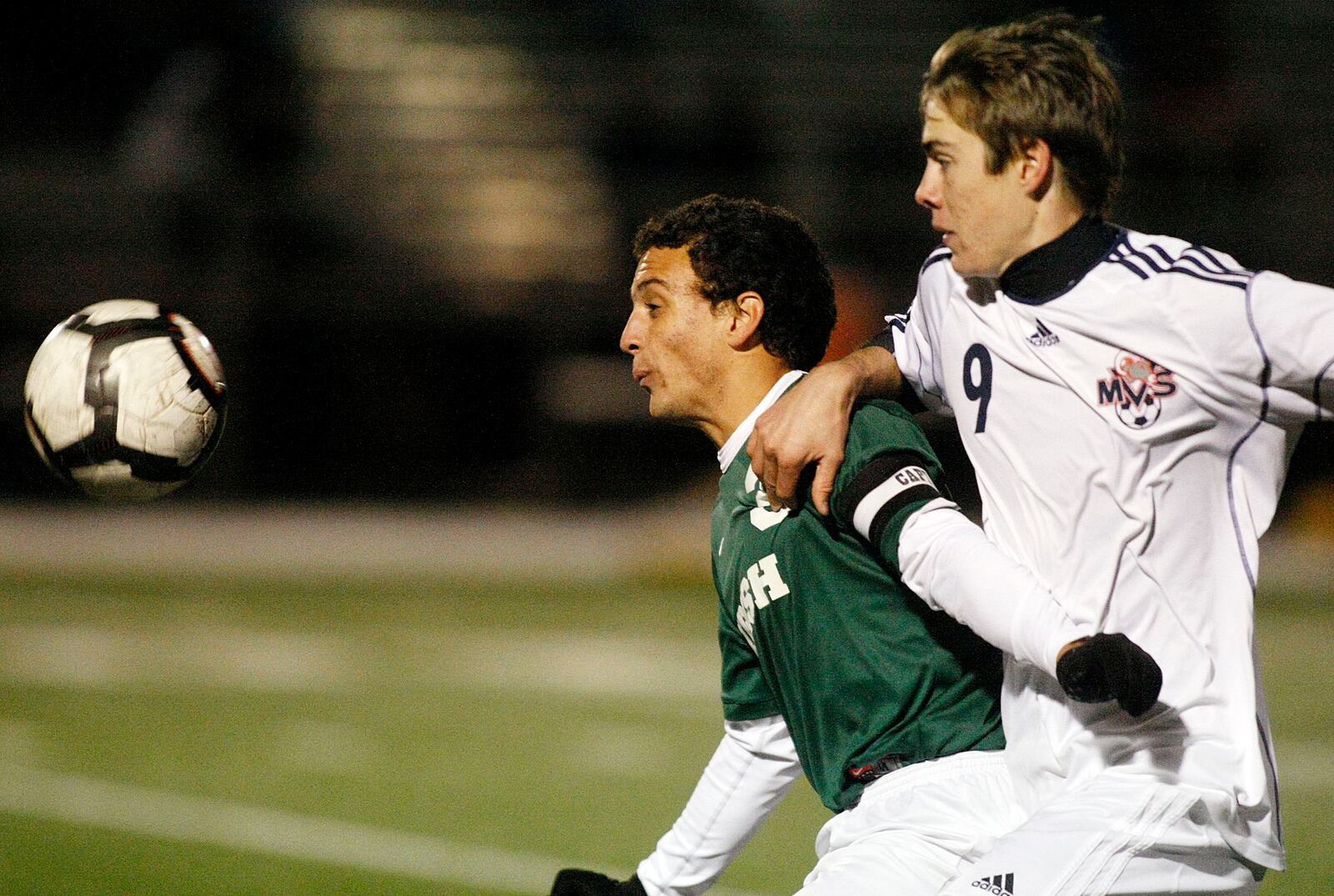 Danny LeMelle (3) of Catholic Central and Cameron Porter (9) of Miami Valley compete for a ball during Thursday's Division III district championship soccer match at Bellbrook High School on Oct. 28, 2010.Staff Photo by Barbara J. Perenic