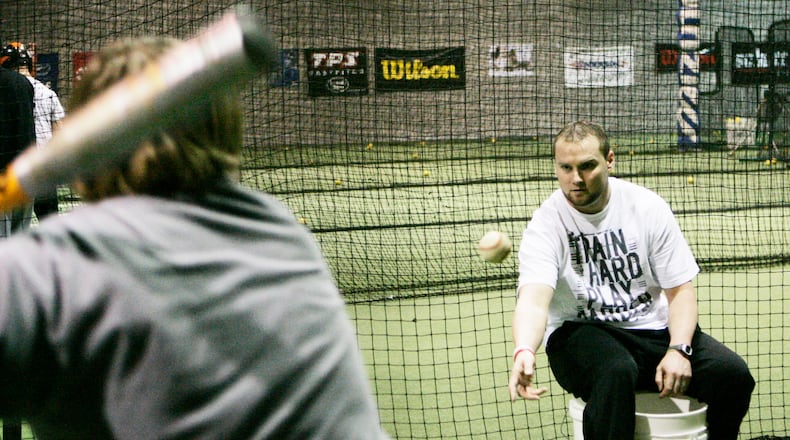 Jeff Kennard (right) became an area personal trainer after retiring from professional baseball. FILE