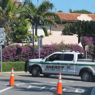 A Palm Beach County Sheriff vehicle blocks traffic near Mar-a-Lago, Sunday, Feb. 22, 2026, in Palm Beach, Fla. (AP Photo/Marta Lavandier)