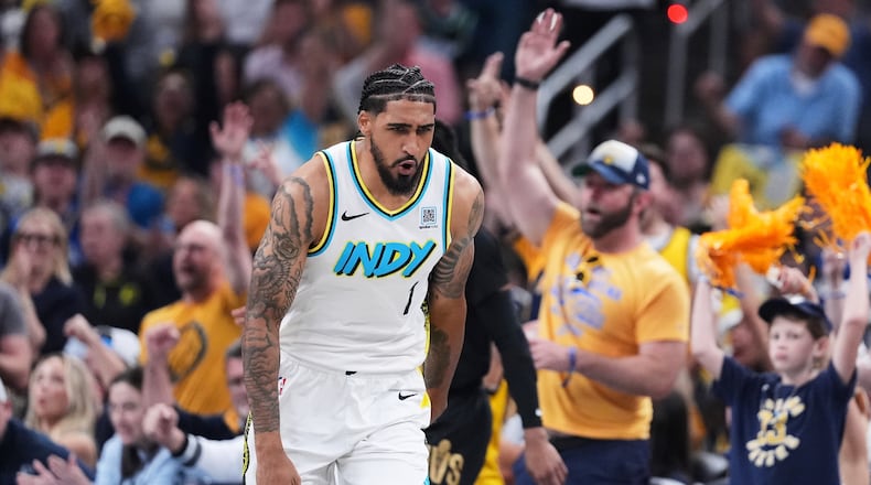 Indiana Pacers forward Obi Toppin (1) reacts to his 3-point basket in the first half against the Cleveland Cavaliers of Game 4 in the Eastern Conference semifinals of the NBA basketball playoffs in Indianapolis, Sunday, May 11, 2025. (AP Photo/Michael Conroy)
