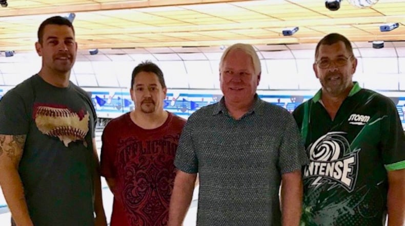 From left, Shawn Aughe (3rd), Chad Morris (1st), proprietor Doug Wilson, Mike McCoy (2nd) after the 9-Pin No-Tap Charity Challenge. CONTRIBUTED