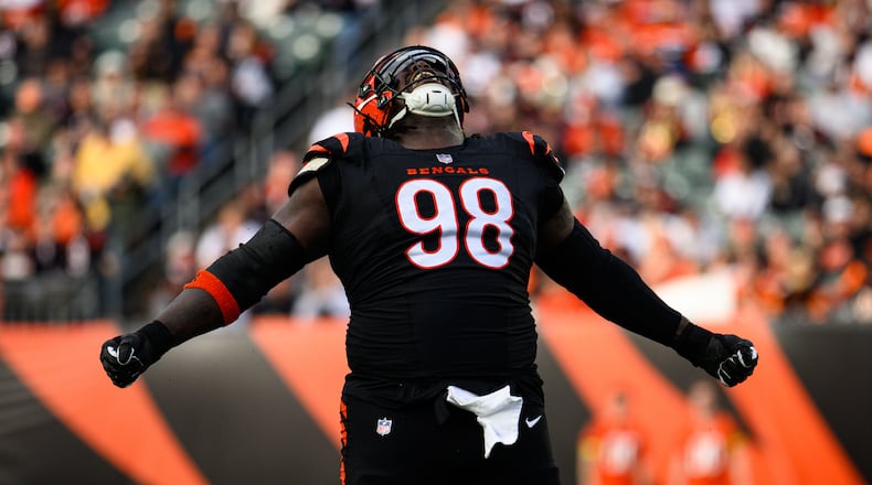 Bengals defensive lineman T.J. Slaton, Jr. celebrates a sack during their game against the Arizona Cardinals at Sunday, Dec. 28, at Paycor Stadium. JEREMY MILLER / CONTRIBUTED PHOTO